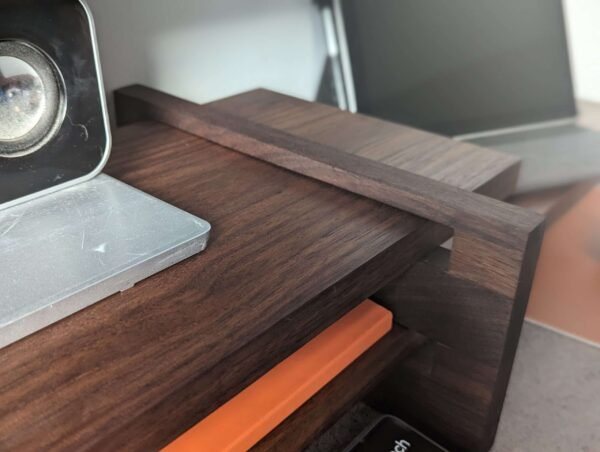 An elegant and stylish solid Black Walnut vinyl storage rack for either 12" LPs or 7" Singles that you'll love to have on display.