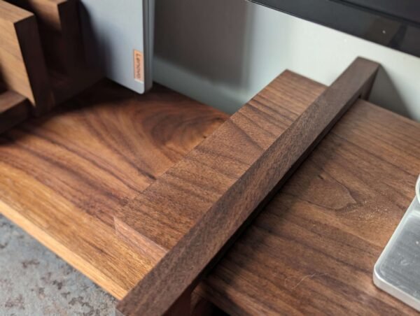 An elegant and stylish solid Black Walnut vinyl storage rack for either 12" LPs or 7" Singles that you'll love to have on display.
