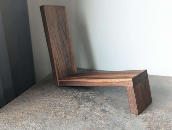 An elegant and stylish solid Black Walnut vinyl storage rack for either 12" LPs or 7" Singles that you'll love to have on display.