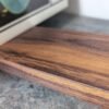 An elegant and stylish solid Black Walnut vinyl storage rack for either 12" LPs or 7" Singles that you'll love to have on display.