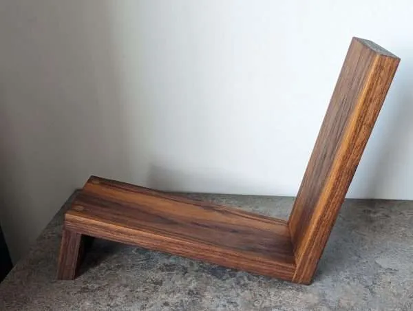 An elegant and stylish solid Black Walnut vinyl storage rack for either 12" LPs or 7" Singles that you'll love to have on display.