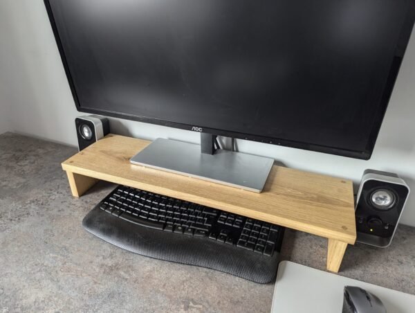 Solid Oak monitor riser with monitor and keyboard