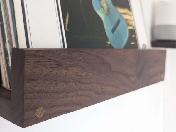 Black walnut wall mounted vinyl shelf