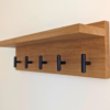 Solid Oak Coat Rack With Shelf - angled view with black hooks