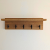Solid Oak Coat Rack With Shelf - straight view with black hooks