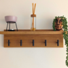 Solid Oak Coat Rack With Shelf - straight view with black hooks and ornaments