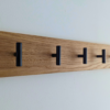 Modern Solid Oak Coat Rack with black Hooks - Angled view