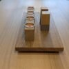 20cm depth oak riser on dining table with candles