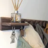 Solid Black Walnut Coat Rack With Shelf & Key Holders - angled view with coats
