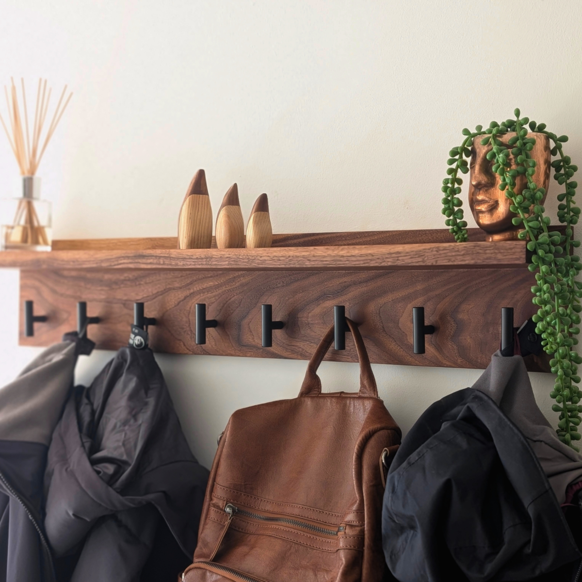 Modern Black Walnut Coat Rack With Shelf - angled far view coats