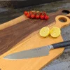 Oak Juliet and Black Walnut Romeo cutting board with knife, bowl and tomatoes