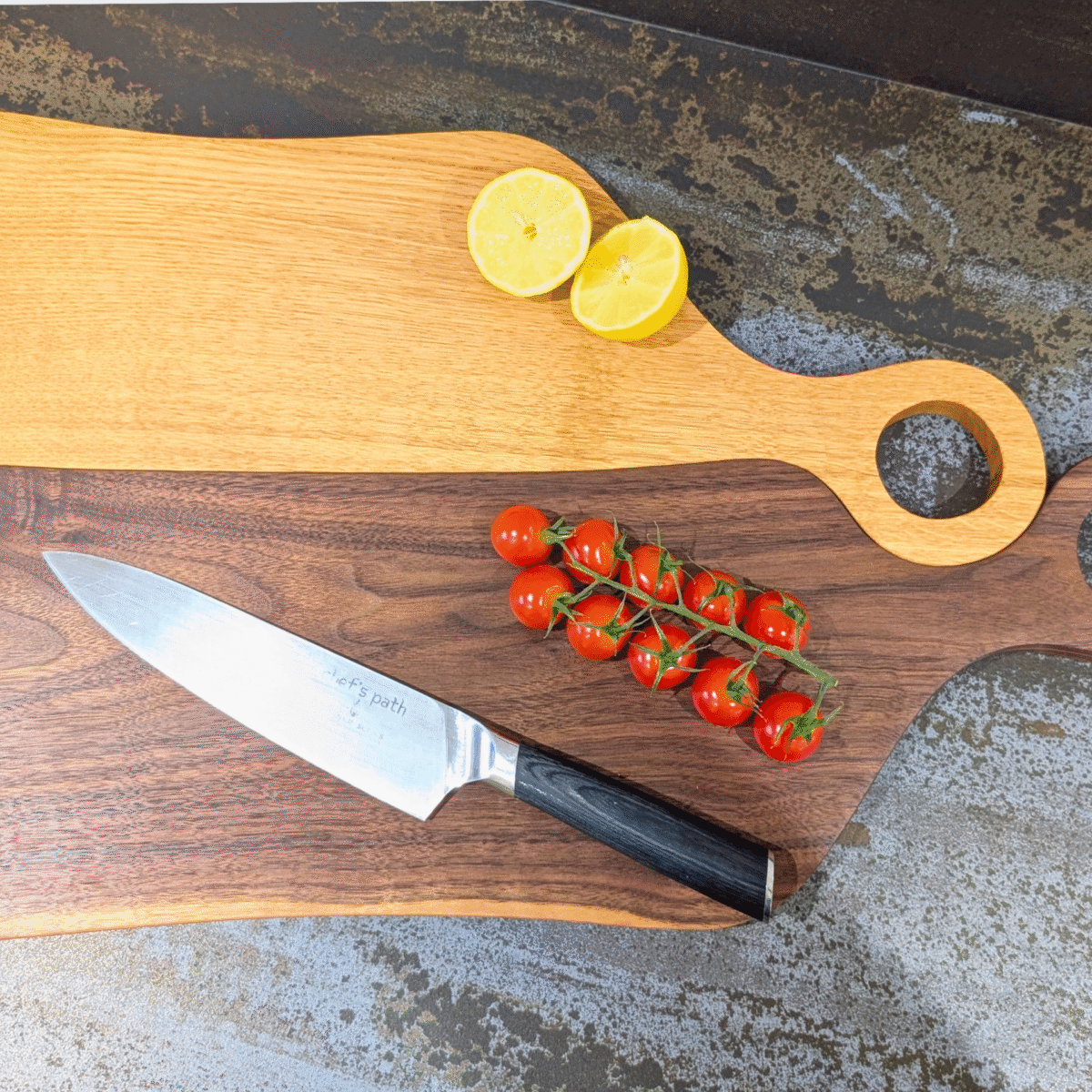 Oak Juliet and Black Walnut Romeo cutting board with knife, bowl and tomatoes