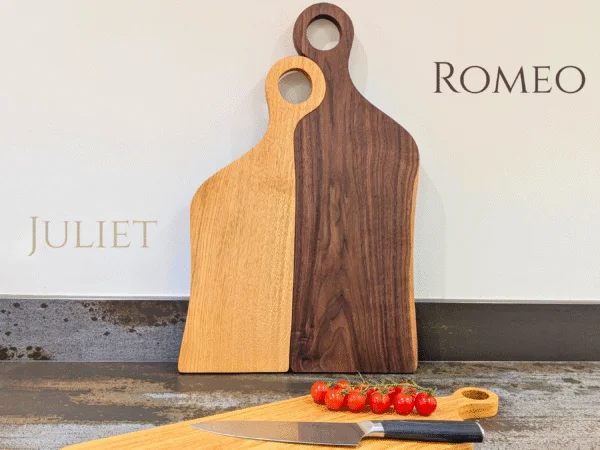 labelled Romeo & Juliet serving boards stood up in kitchen