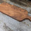 Solid Black Walnut Chopping Board - Angled image on kitchen side