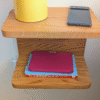 Solid Oak Floating Bedside Shelf with phone and books - straight image
