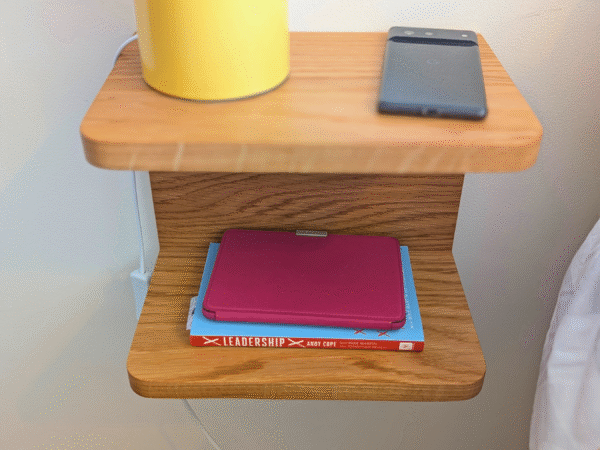 Solid Oak Floating Bedside Shelf with phone and books - straight image