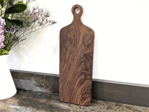 Solid Black Walnut Chopping Board - Angled image standing up