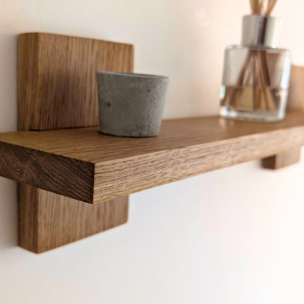 Modern Solid Oak Scandi Floating Shelf angled image with ornaments