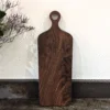 Solid Black Walnut Chopping Board - Angled image standing up