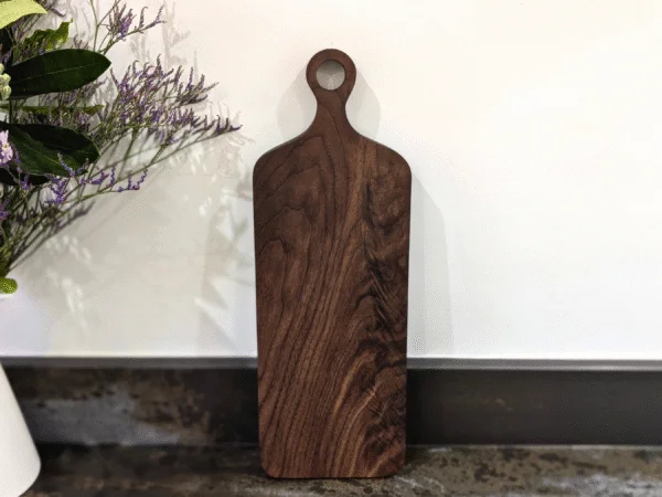 Solid Black Walnut Chopping Board - Angled image standing up