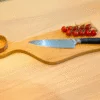 Oak Juliet cutting board with knife, bowl and tomatoes