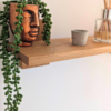 Modern Solid Oak Scandi Floating Shelf close up angled image with ornaments