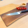 Oak Juliet and Black Walnut Romeo cutting board with knife, bowl and tomatoes
