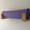 Solid Oak yoga mat hooks - wall mounted far apart, angled image
