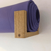 Solid Oak yoga mat hooks - wall mounted close up view