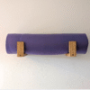 Solid Oak yoga mat hooks - wall mounted close together with mat overhanging