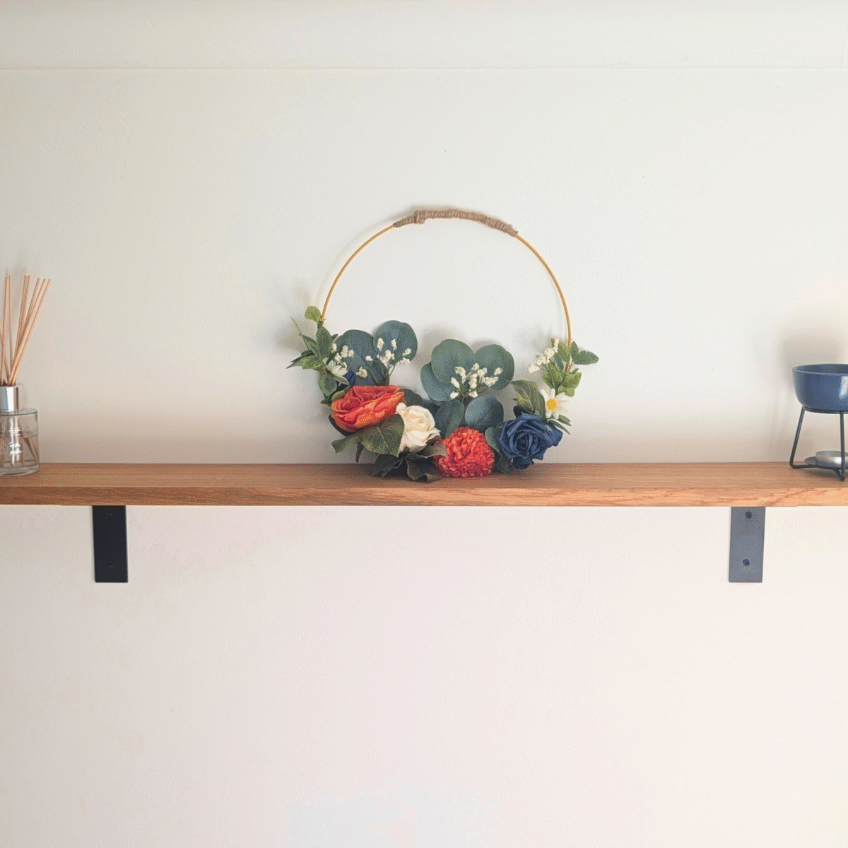 Wall mounted Oak shelf with rounded corners and cast iron brackets