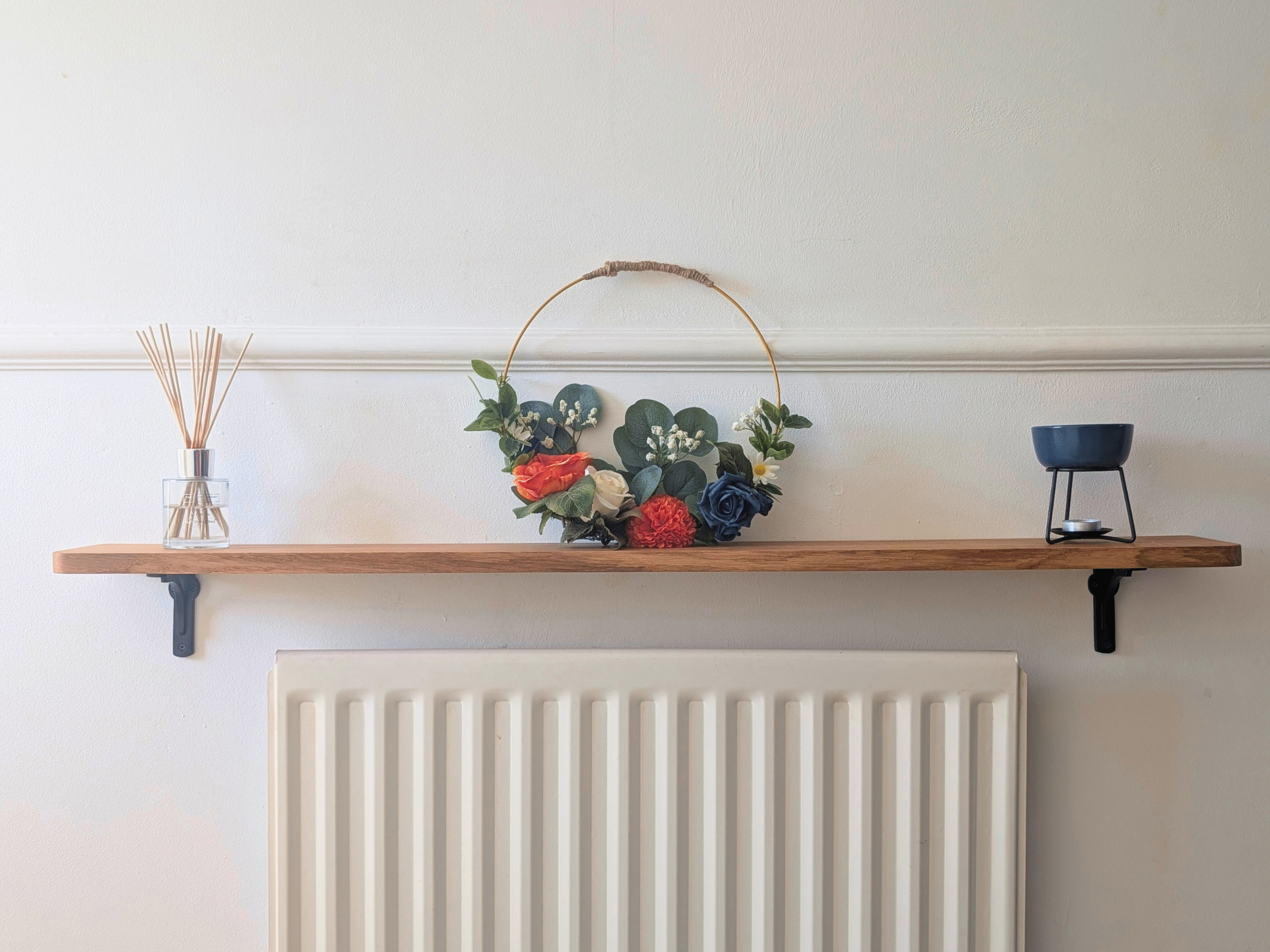 Oak radiator shelf with cast iron brackets