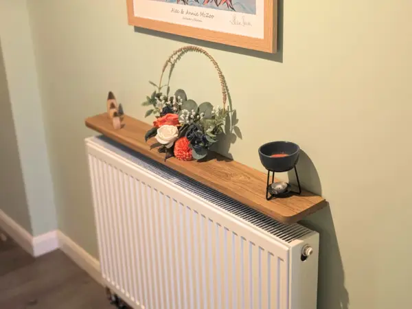 110cm no drill oak shelf with ornaments - angled image