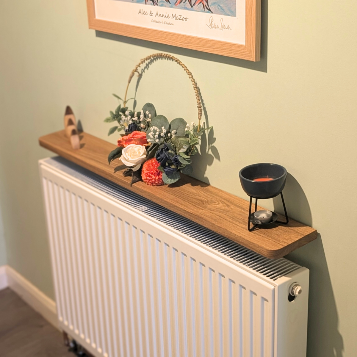 110cm no drill oak shelf with ornaments - angled image