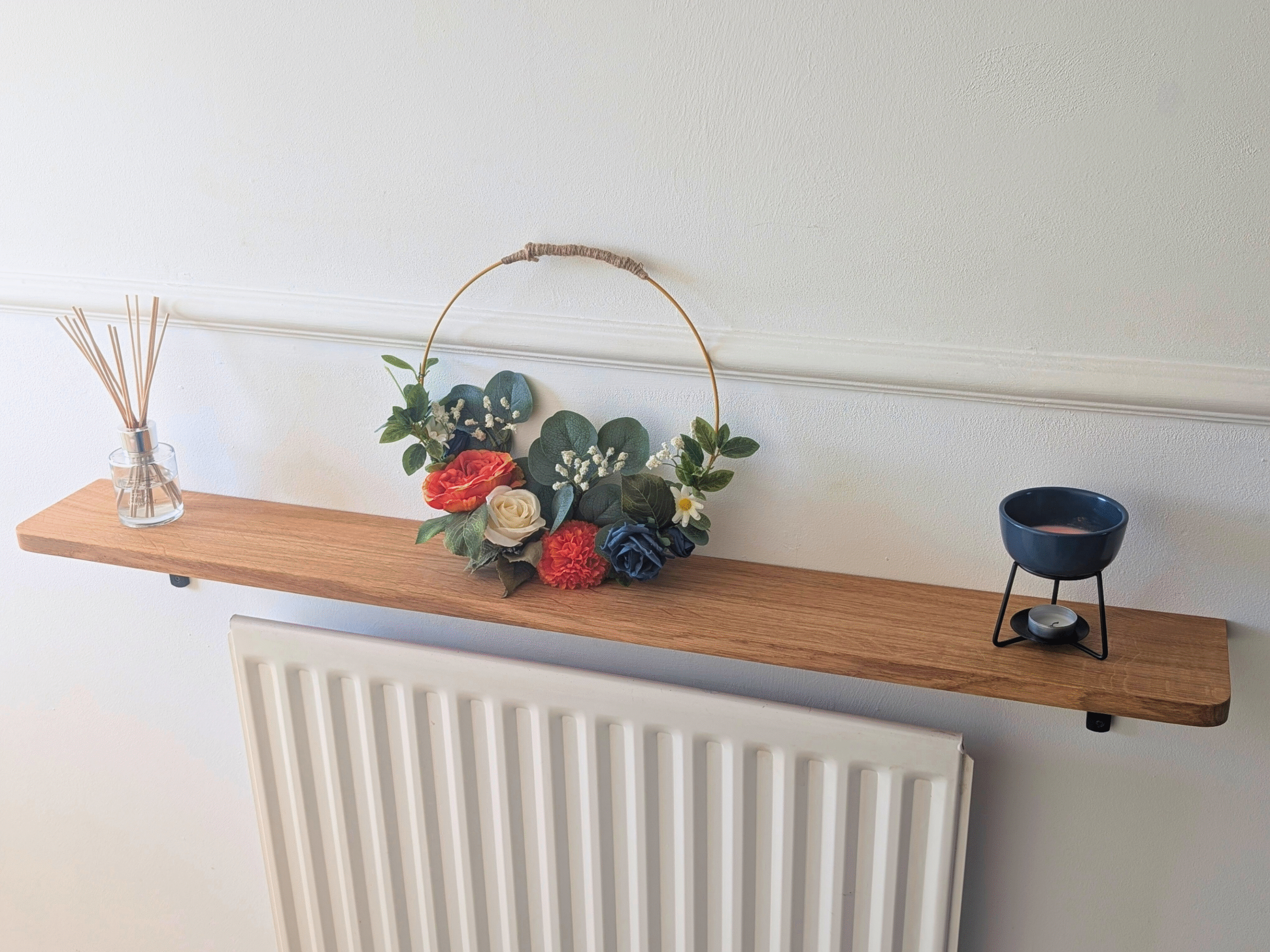 Oak radiator shelf with cast iron brackets
