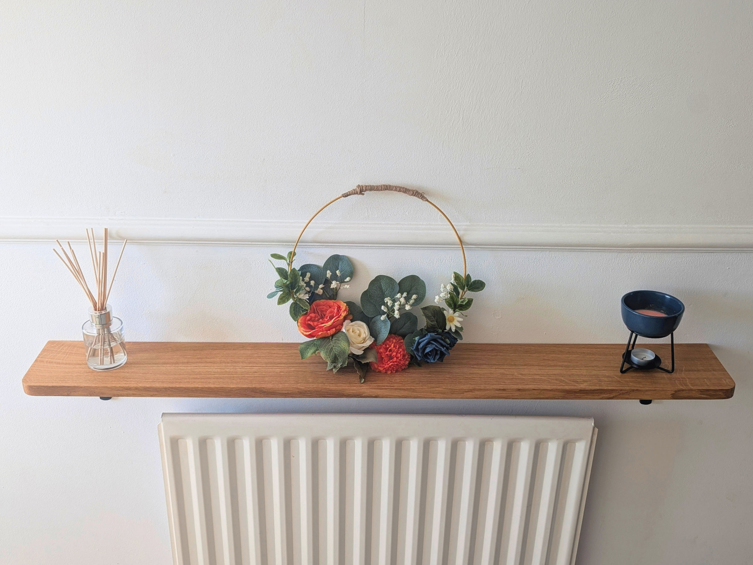 Oak radiator shelf with cast iron brackets