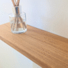 Oak radiator shelf with cast iron brackets