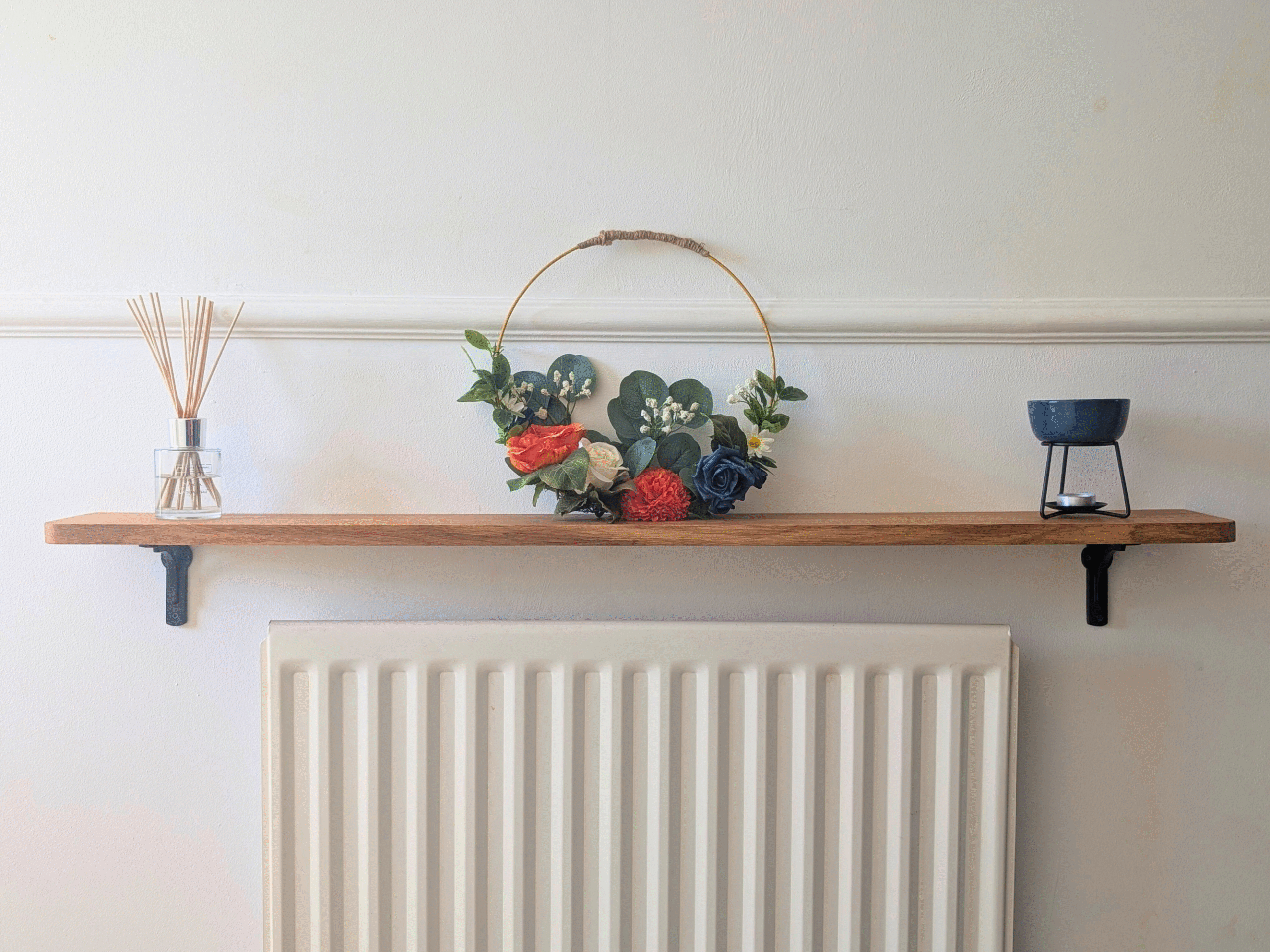 Oak radiator shelf with cast iron brackets