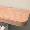110cm no drill oak radiator shelf - closeup image of corner
