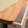 110cm no drill oak radiator shelf - closeup image