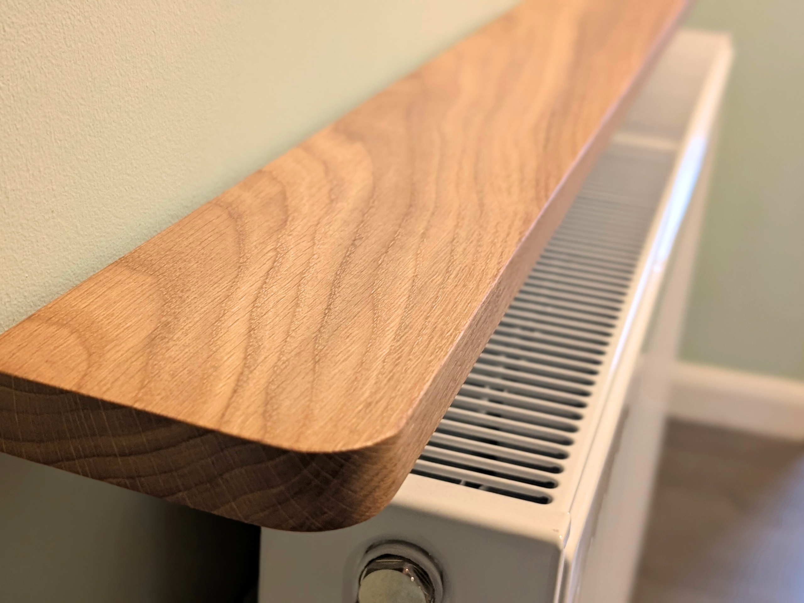 110cm no drill oak radiator shelf - closeup image
