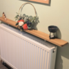 120cm no drill oak radiator shelf 10cm depth - angled image