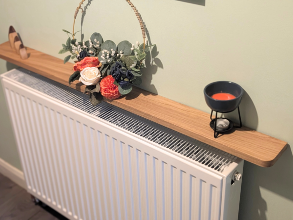 120cm no drill oak radiator shelf 10cm depth - angled image