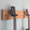 Solid Oak Double Guitar Wall mount with 2 guitars - close angled image