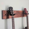 Solid Black Walnut Double Guitar Wall Mount - angled image