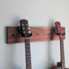 Solid Black Walnut Double Guitar Wall Mount - angled image