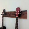 Solid Black Walnut Double Guitar Wall Mount - angled image