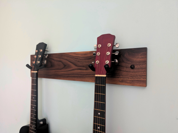 Solid Black Walnut Double Guitar Wall Mount - angled image