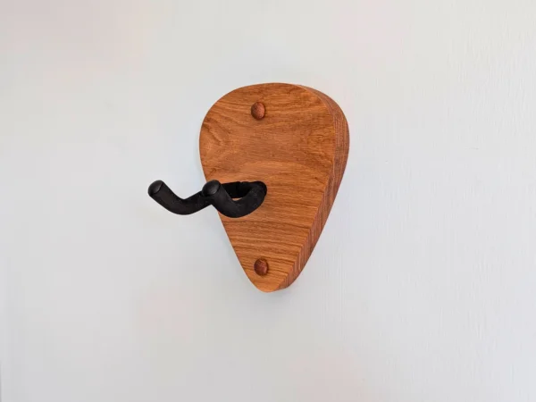 Solid Oak Plectrum Guitar Mount - no guitar, closeup angled image