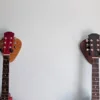 Solid Oak Plectrum Guitar Mount - with walnut version and guitars